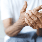 Wrinkly aged hands self soothing.